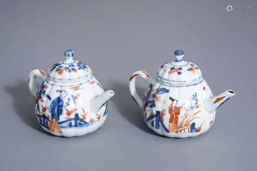 A pair of Chinese Imari style teapots and covers w...