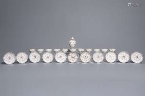 A Chinese 23 piece partly gilt tea set with a butt...