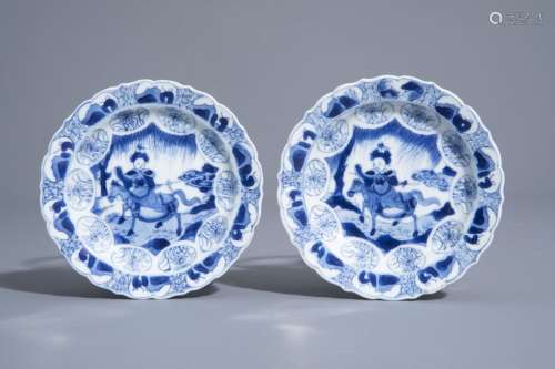 A pair of Chinese blue and white horserider saucer...