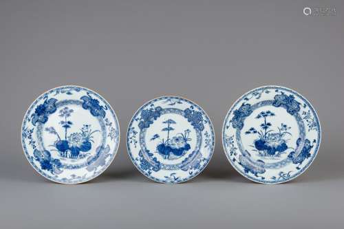 A pair of Chinese blue and white chargers and a pl...