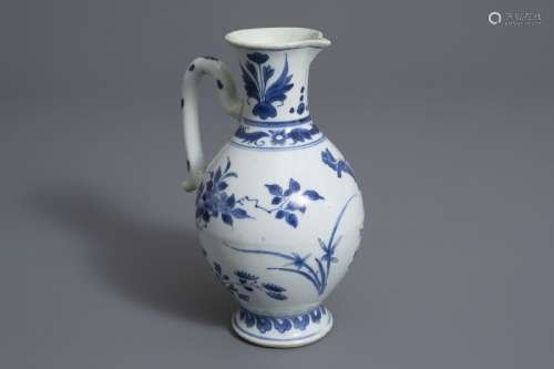 A Chinese blue and white jug with floral design, T...