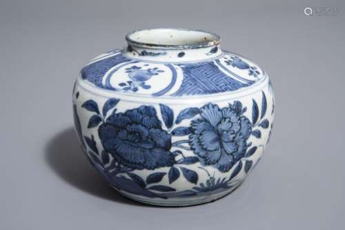 A Chinese blue and white vase with birds on blosso...