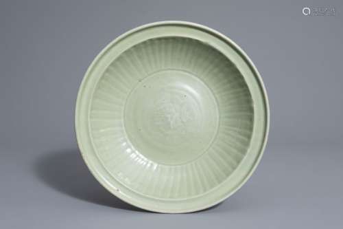 A Chinese Longquan celadon dish with incised desig...