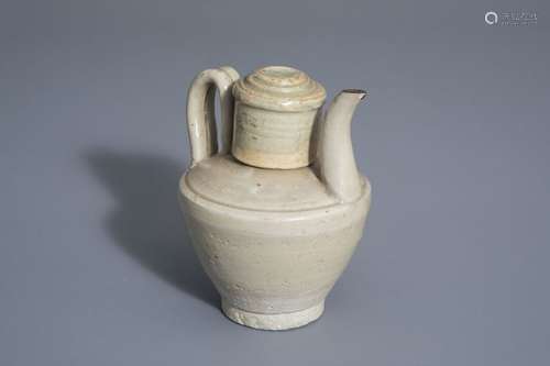 A Chinese monochrome celadon ewer and cover, prob....