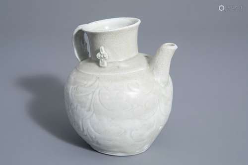 A Chinese Yaozhou style celadon ewer, Song or late...