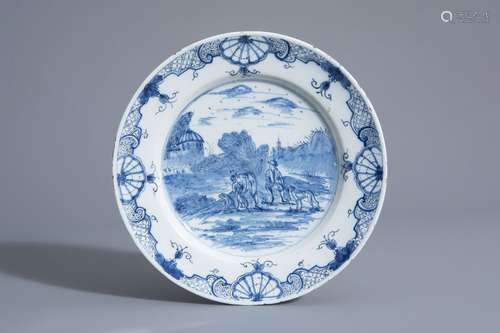 A Dutch Delft blue and white dish with hunters and...