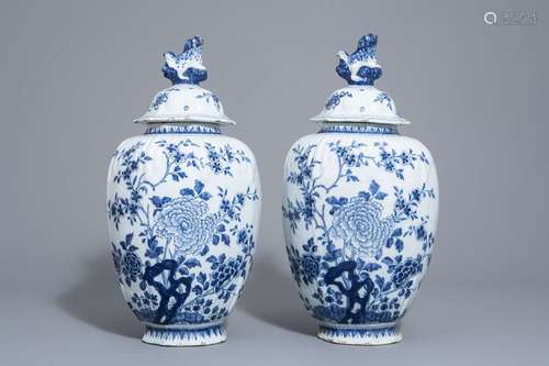 A pair of large Dutch Delft blue and white covered...