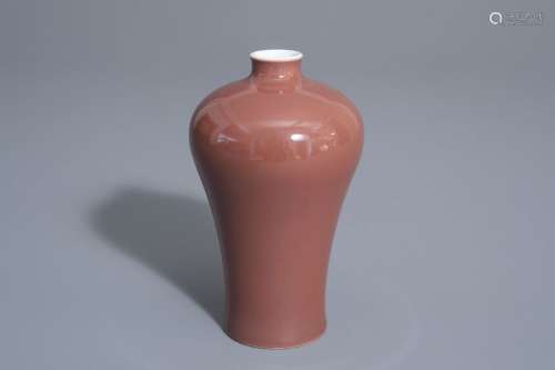 A Chinese monochrome red meiping vase, 19th/20th C...