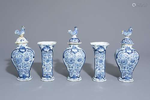 A Dutch Delft blue and white five piece garniture ...