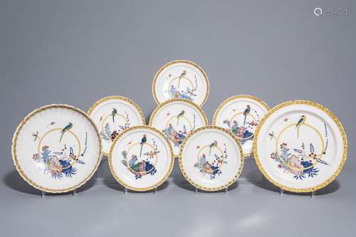 Eight Dutch Delft polychrome chargers and plates w...