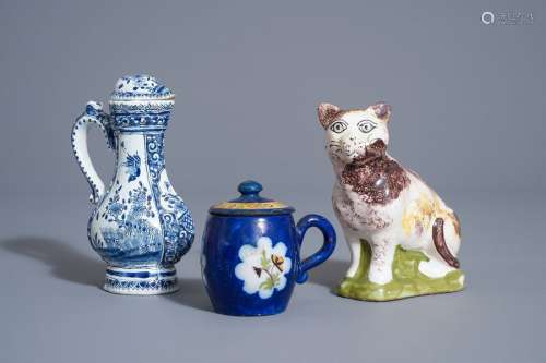 A Brussels faience cat, a mustard jar and a blue a...