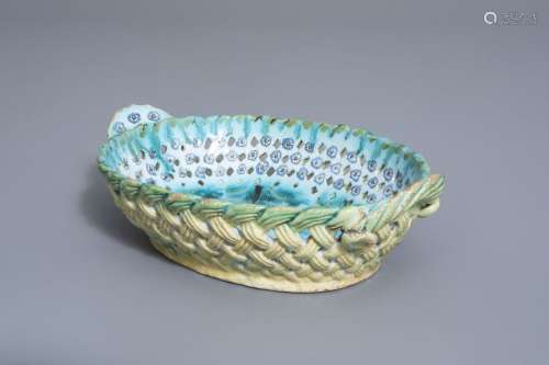 A Brussels faience open worked basket with floral ...