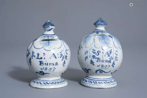 A pair of blue and white money banks, dated 1807, ...