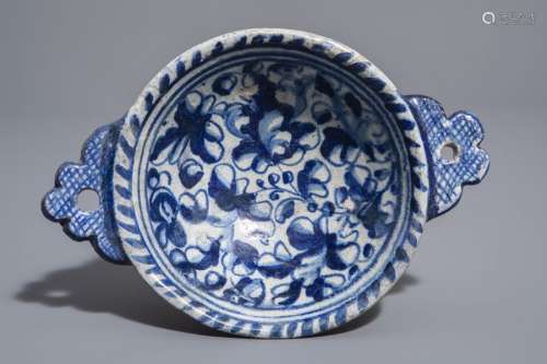 A blue and white Antwerp maiolica porringer with a...