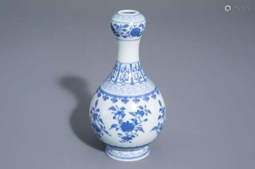 A Chinese blue and white garlic head mouth vase wi...