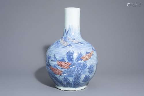 A large Chinese blue, white and copper red bottle ...