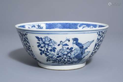 A Chinese blue and white bowl with birds and flowe...