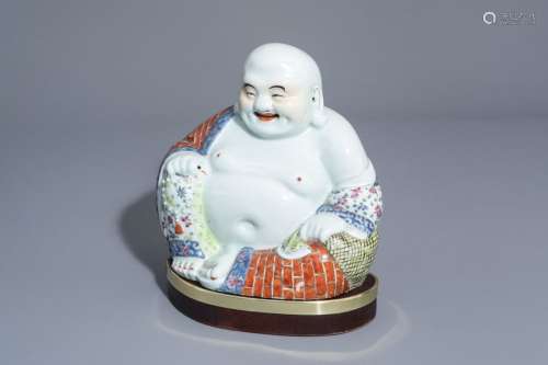 A Chinese famille rose figure of Buddha, 19th/20th...