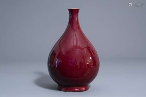 A Chinese monochrome sang de boeuf bottle vase, 19...