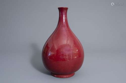 A Chinese monochrome sang de boeuf bottle vase, 19...