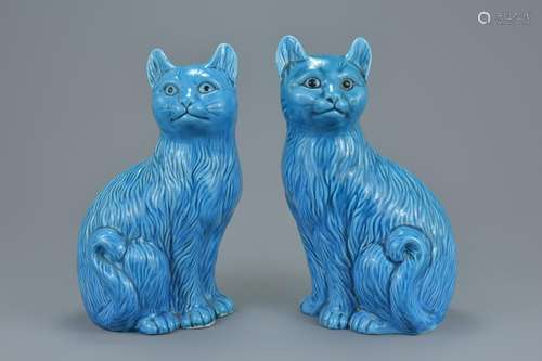 A pair of Chinese turquoise glazed porcelain figures or