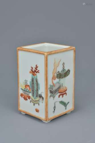 A Chinese late 19th century porcelain brush holder.