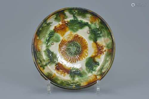 A Chinese Liao dynasty Sancai glazed shallow dish with