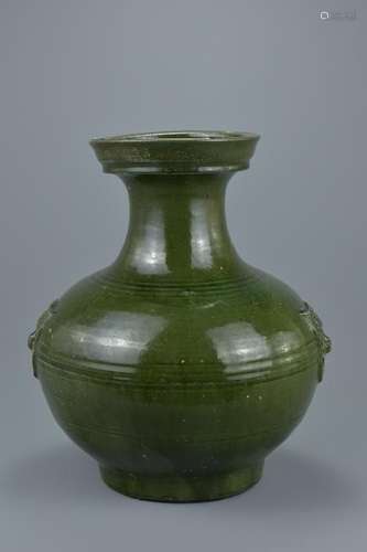 A Chinese Han dynasty (206 BC - 220 AD) dark green