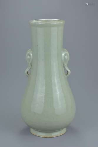 A Chinese 18th century celadon glazed bottle vase with