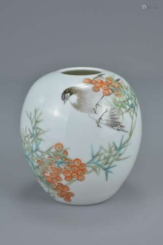 A small Chinese famille rose porcelain pot decorated