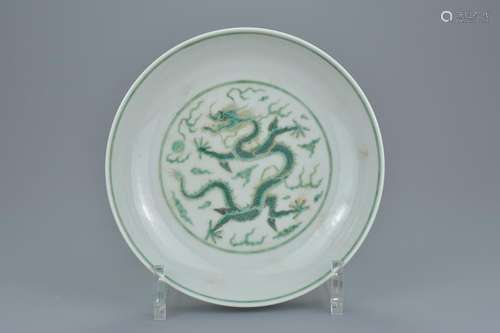 A Chinese green enamel porcelain dragon dish with