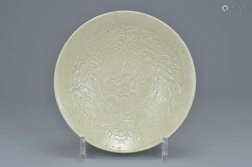 A Chinese Song dynasty (960-1279) Ding type bowl with