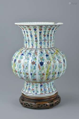 A Chinese 18/19th century doucai porcelain vase on a