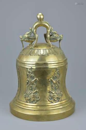 A large Chinese polished bronze bell gong mounted with
