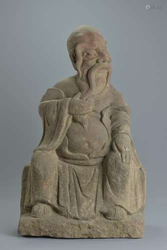 A large Chinese Ming or later carved stone figure of