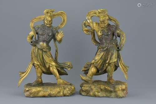 A pair of Chinese gilt bronze figures of Guardians