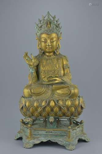 A large Chinese gilt bronze figure of Guanyin seated in