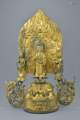 A large Chinese gilt bronze shrine of Buddha and two