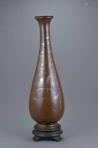 A tall Chinese 19/20th century bronze vase with fine