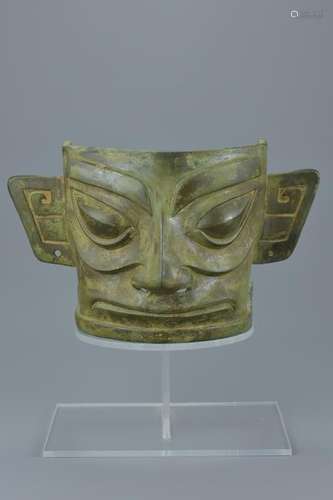 A Chinese Archaic Sanxingdui style bronze mask on