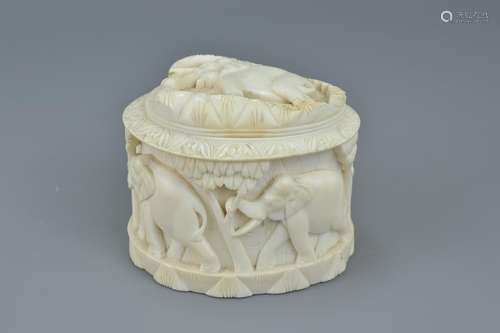 An early 20th century carved African ivory box and