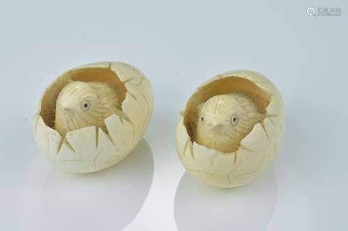 A pair of Japanese 19/20th century carved ivory netsuke