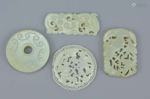 Four Chinese carved celadon jade pendants. 5Cm - 6cm