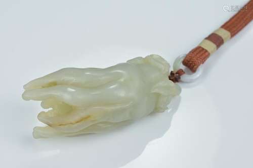 A Chinese pale greenish white jade carving of a