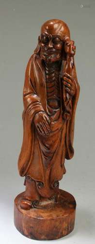 A Carved HuangYangMu Damo Statue