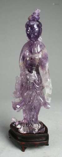 A Carved Lavender Crystal Maiden Statue