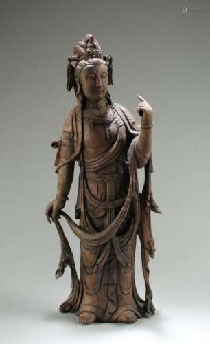 A Carved Wooden Standing Guanyin Statue