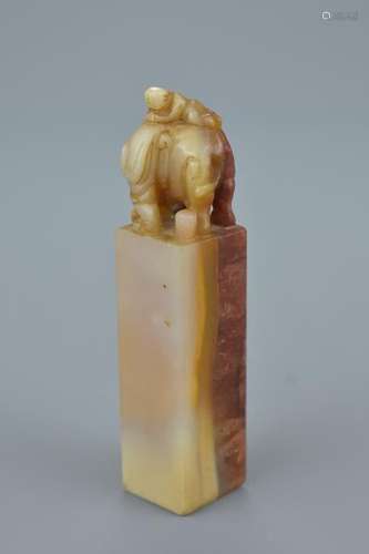 A Chinese 19/20th century soapstone seal surmounted