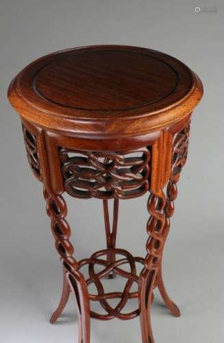 A Carved Hardwood Stand