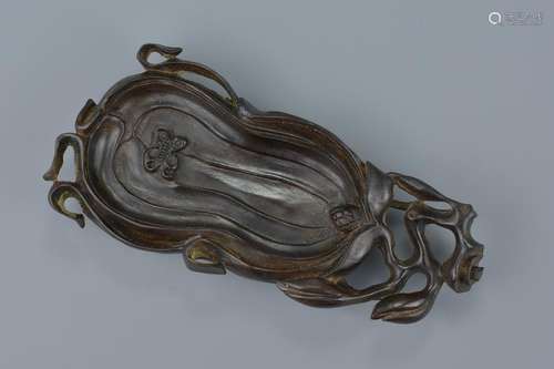 A small Chinese carved hardwood tray in the form of an